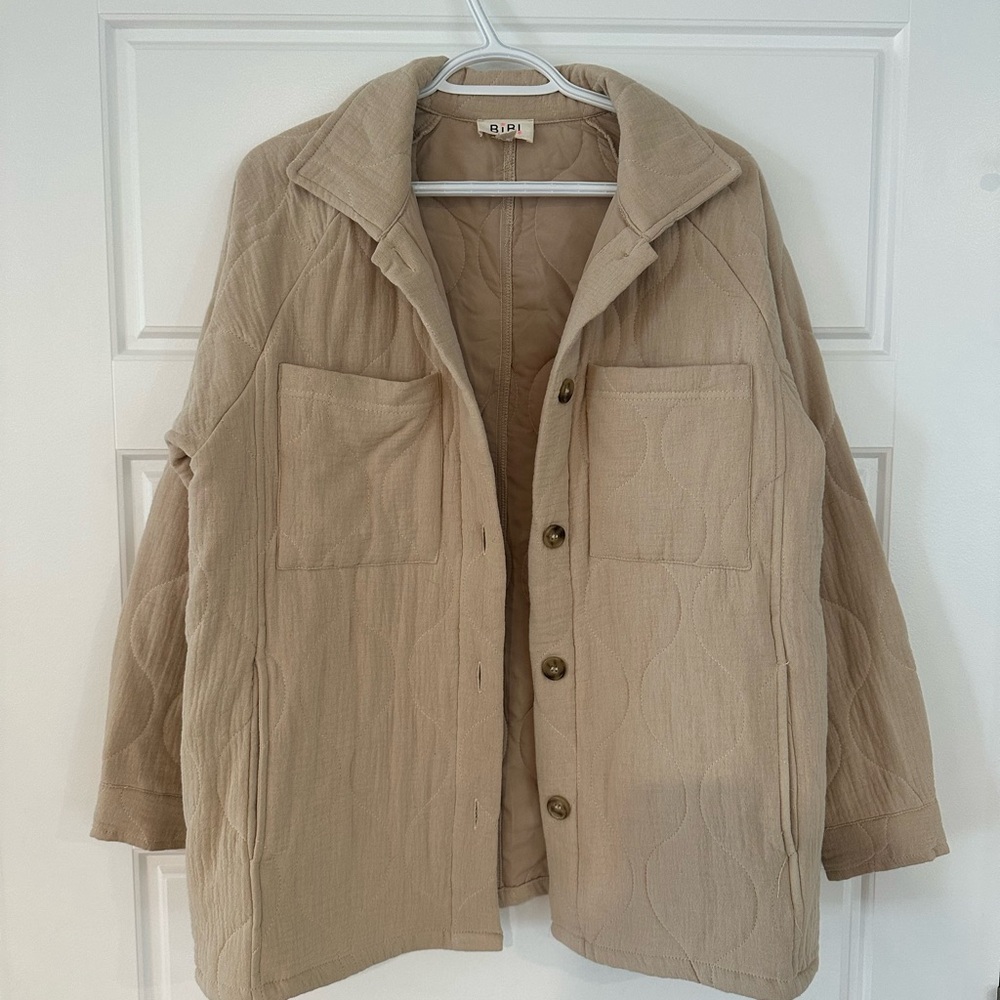 Lightweight quilted jacket. Oversized fit. Size small. Oatmeal colour.